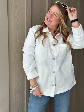 smart white denim jacket with a boyfriend fit